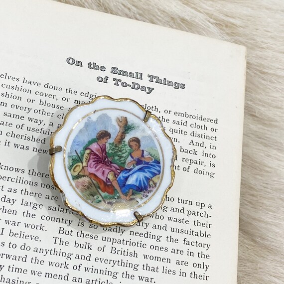 Tiny Limoges France antique plate brooch.