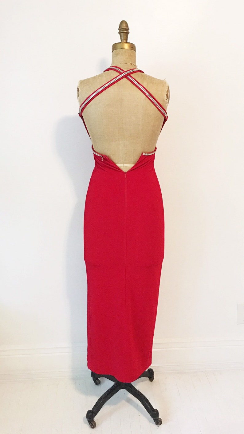 Red hot rhinestone trimmed stretch gown with low back Size S.