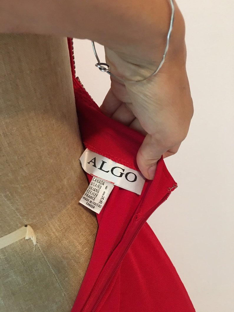 Red hot rhinestone trimmed stretch gown with low back Size S.