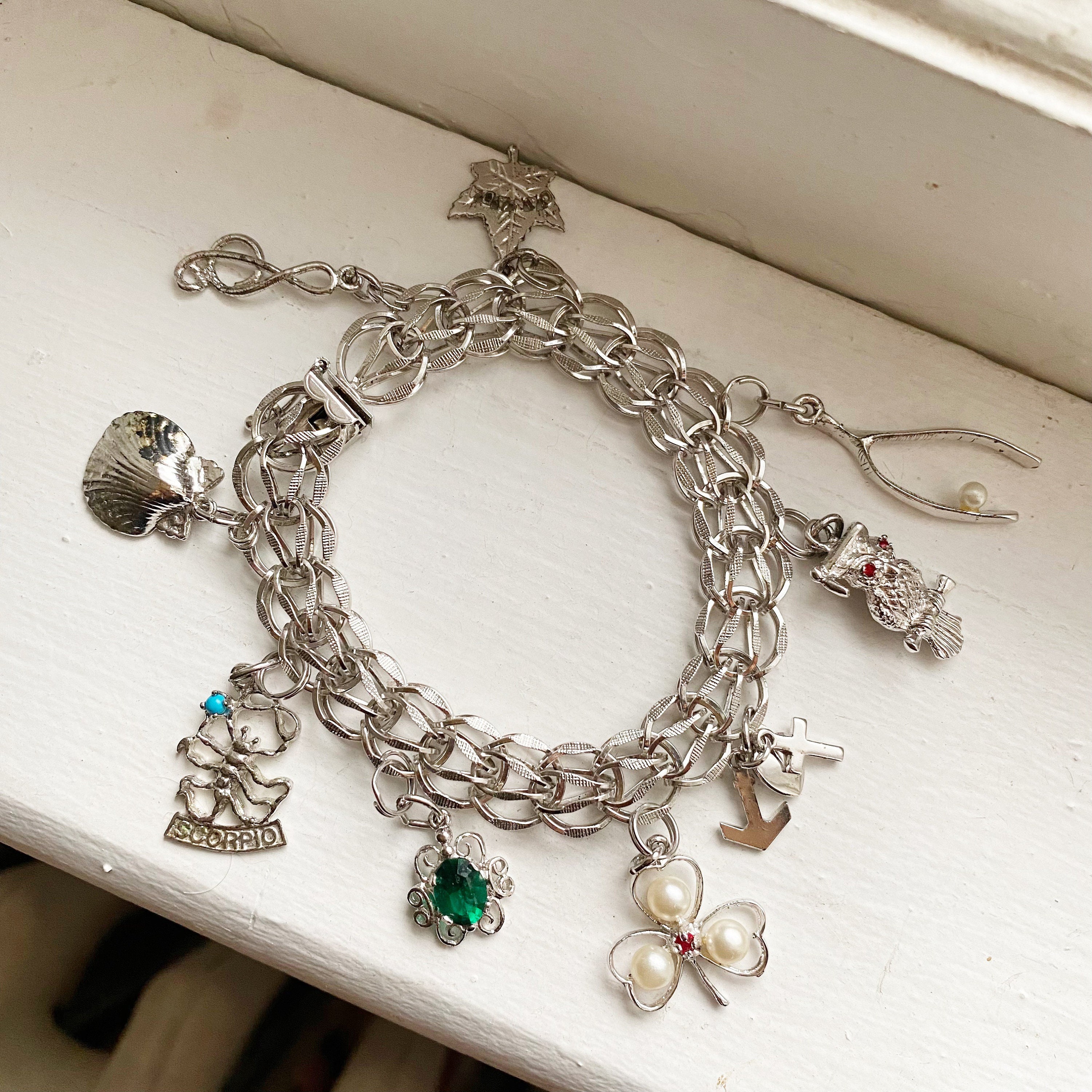 Sterling Charm Bracelet with Assorted Charming Charms.