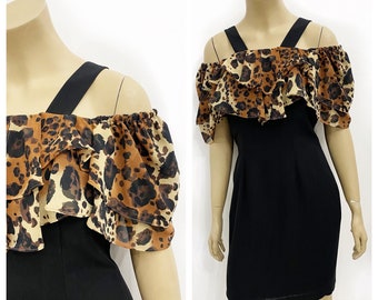 Little black dress with off the shoulder leopard ruffles. Size S.