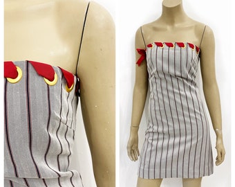 Strapless straight across Ports mini dress with grommet neckline. Size XS/S.