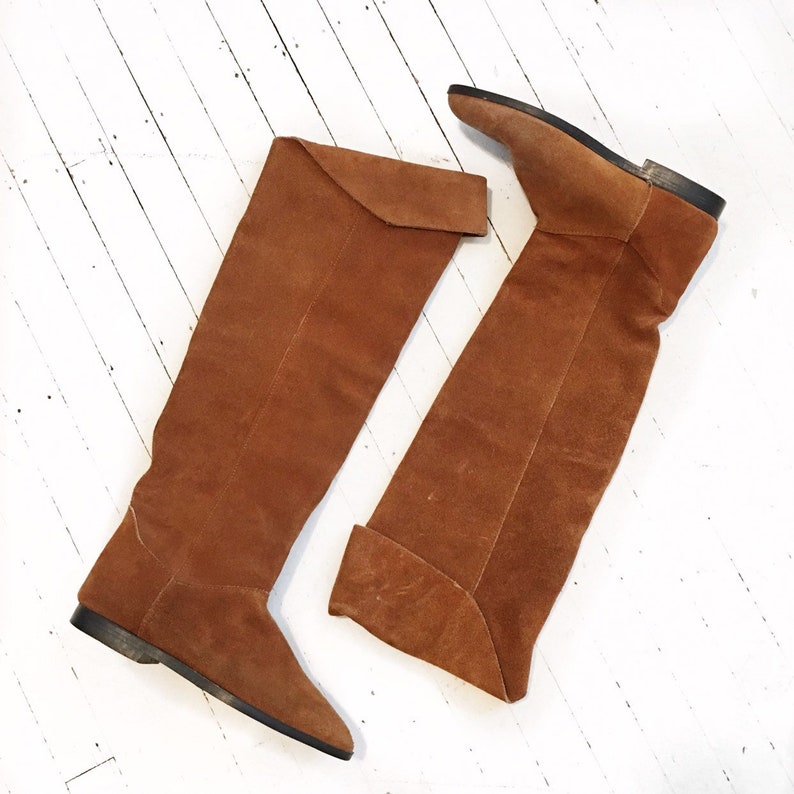 Size 66.5. Brown suede knee high flat walking boots