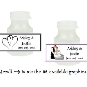 May include: Two clear plastic bubble bottles with labels. The labels are white with black text and graphics. The text on the labels reads "Ashley & Justin June 2nd, 2016". One label features a graphic of two hearts. The other label features a graphic of a bride and groom standing in front of a wedding cake.