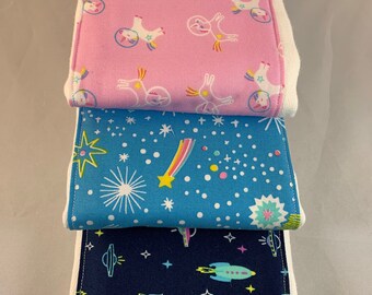 Burp cloths, unicorns, space, planets, shuttle, satellite, stars, baby