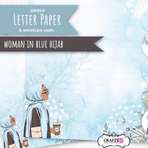 May include: Printable letter paper featuring a woman wearing a blue hijab and holding a cup of coffee. The paper has a light blue background with white polka dots and floral designs. The text "Woman in Blue Hijab" is printed at the top of the page.