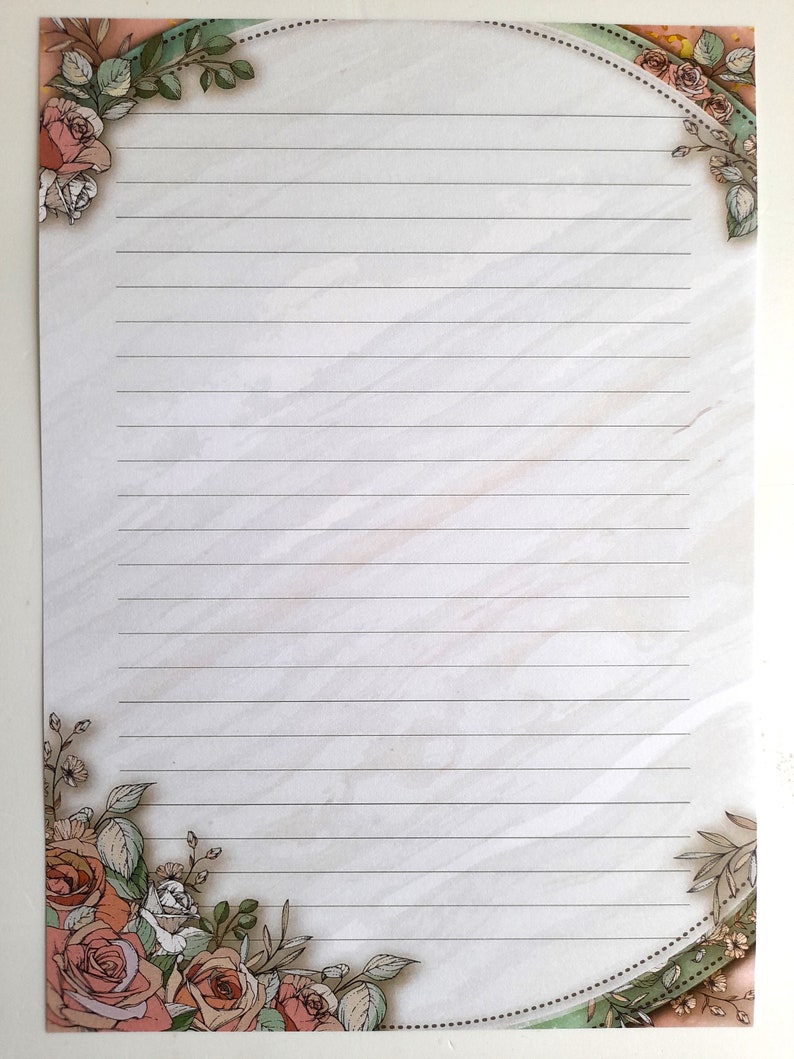 May include: A lined sheet of paper with a floral border. The border features pink and white roses, green leaves, and a light green and white background.