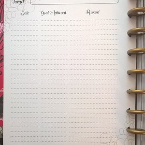 May include: A white page with black text and lines. The text reads "1 pebble = Target. Date Goal Achieved Reward." The page has a decorative border of gray circles. The text at the bottom of the page reads "With will one can do anything."
