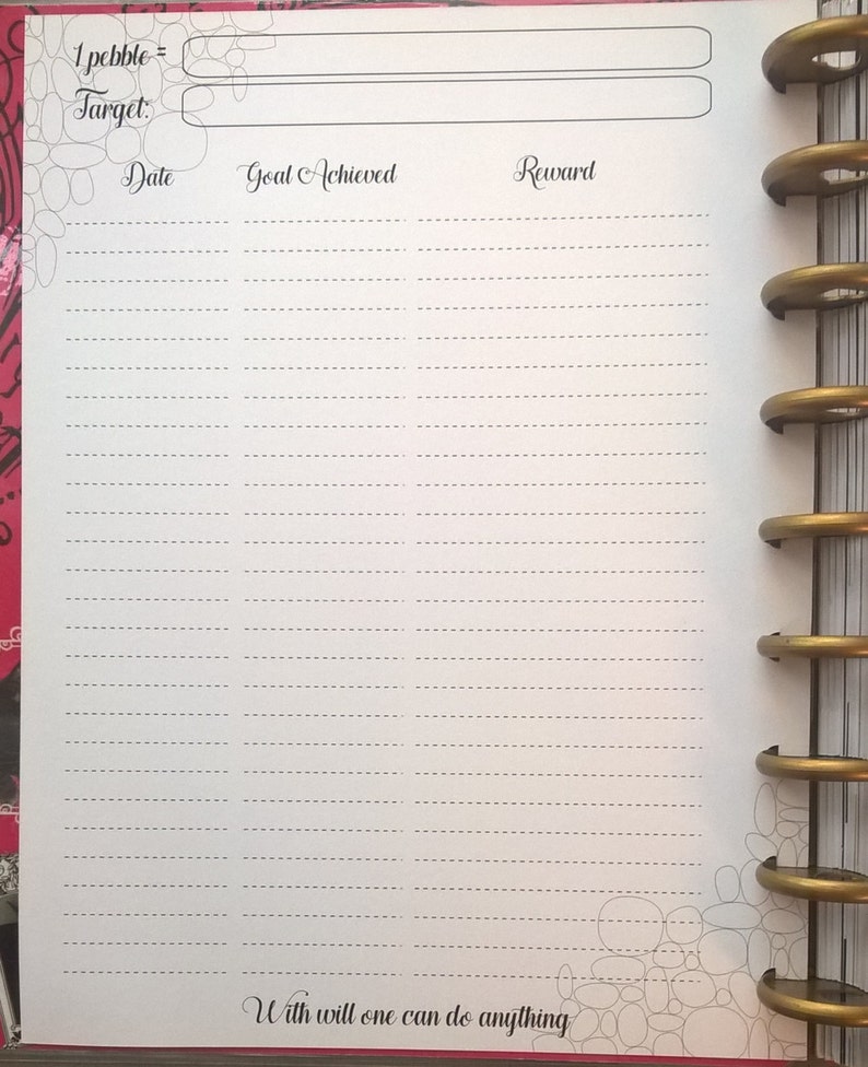 May include: A white page with black text and lines. The text reads "1 pebble = Target. Date Goal Achieved Reward." The page has a decorative border of gray circles. The text at the bottom of the page reads "With will one can do anything."