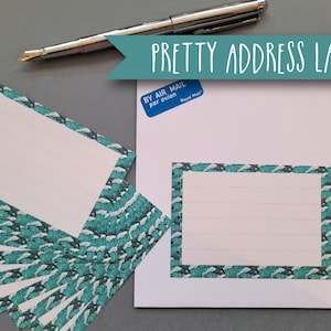 May include: A set of 8 teal and white address labels with a wave pattern. The labels have a white background with teal lines and a teal border. The text "PRETTY ADDRESS LABELS" is visible at the top of the image.