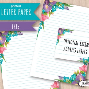May include: Printed letter paper with a floral design featuring purple irises, pink tulips, and blue forget-me-nots. The paper has blue lines and the text "IRIS" is printed in purple.