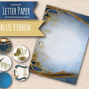 May include: Blue and gold letter paper with a blue ribbon design and matching envelope seals. The paper has a blue background with gold lines and a floral design. The seals feature a bird, a floral design, and a blue ribbon.