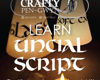 May include: Two translucent, cone-shaped lampshades featuring black calligraphy text, including the words GLASS and SOFT CALLIGRAPHY. The text CRAFTY PEN-GWYN with a penguin illustration appears at the top. A lit candle sits in the foreground.