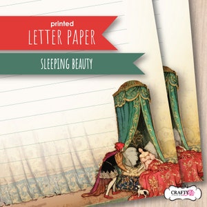 May include: Printable letter paper featuring an illustration of Sleeping Beauty in a bed with a prince kneeling beside her. The paper has a green and red banner at the top with the text "printed LETTER PAPER SLEEPING BEAUTY".