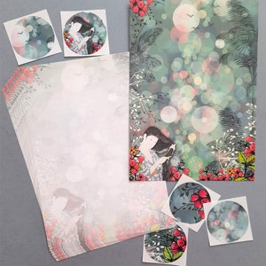 May include: A set of stationery featuring a whimsical design with a woman in a forest setting. The paper is white with a light blue and green background and features a woman with long dark hair and a red flower in her hair. The design also includes a variety of flowers and leaves in shades of red, pink, and green.