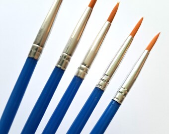 Set of fine point artist paint brushes for precision painting and detailed work