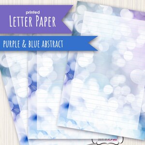 May include: Printable letter paper with a purple and blue abstract design featuring a blurred background of white circles. The text "printed LETTER PAPER PURPLE & BLUE ABSTRACT" is at the top of the page.
