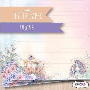 May include: Printed letter paper with a fairytale theme. The paper features a light blue, pink, and white background with a delicate floral design. The text "printed letter paper fairytale" is displayed in a banner at the top of the page. The paper is lined for writing.