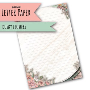 May include: Printed letter paper with a dusky floral design. The paper has a white background with light gray lines and a circular border with a floral design. The text "printed letter paper" and "dusky flowers" is at the top of the page.