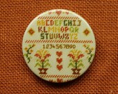 Needle minder cross stitch, magnetic needle keeper, 1.5 inch sampler pattern pin keep with strong rare earth magnets. Stitching gift for mom