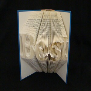 Best--inspirerende woorden--4 letters--gevouwen-boek kunst sculptuur