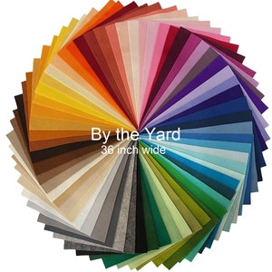 May include: A fan-shaped arrangement of 36-inch wide felt fabric in various colors, including red, orange, yellow, green, blue, purple, and brown. The text "By the Yard" and "36 inch wide" is printed in black on a white background.