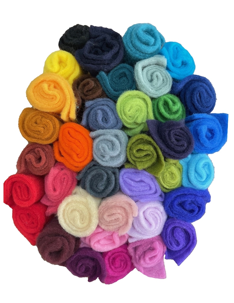 May include: A collection of 30 rolls of colorful wool roving, perfect for felting projects. The roving is arranged in a rainbow pattern, with each roll a different color.