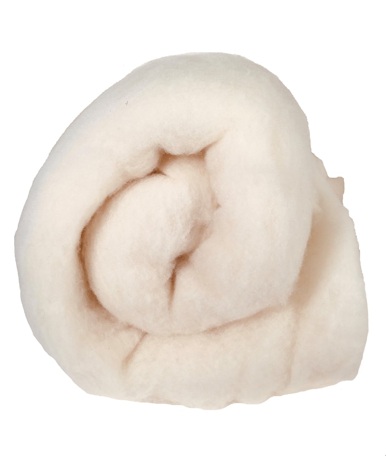 May include: A roll of white wool roving, a natural fiber used for spinning, felting, and other crafts.