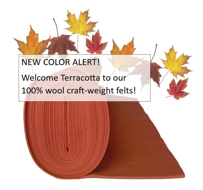 May include: A roll of terracotta-colored 100% wool felt. The felt is rolled up and the end is laying flat. The text "NEW COLOR ALERT! Welcome Terracotta to our 100% wool craft-weight felts!" is displayed above the felt.
