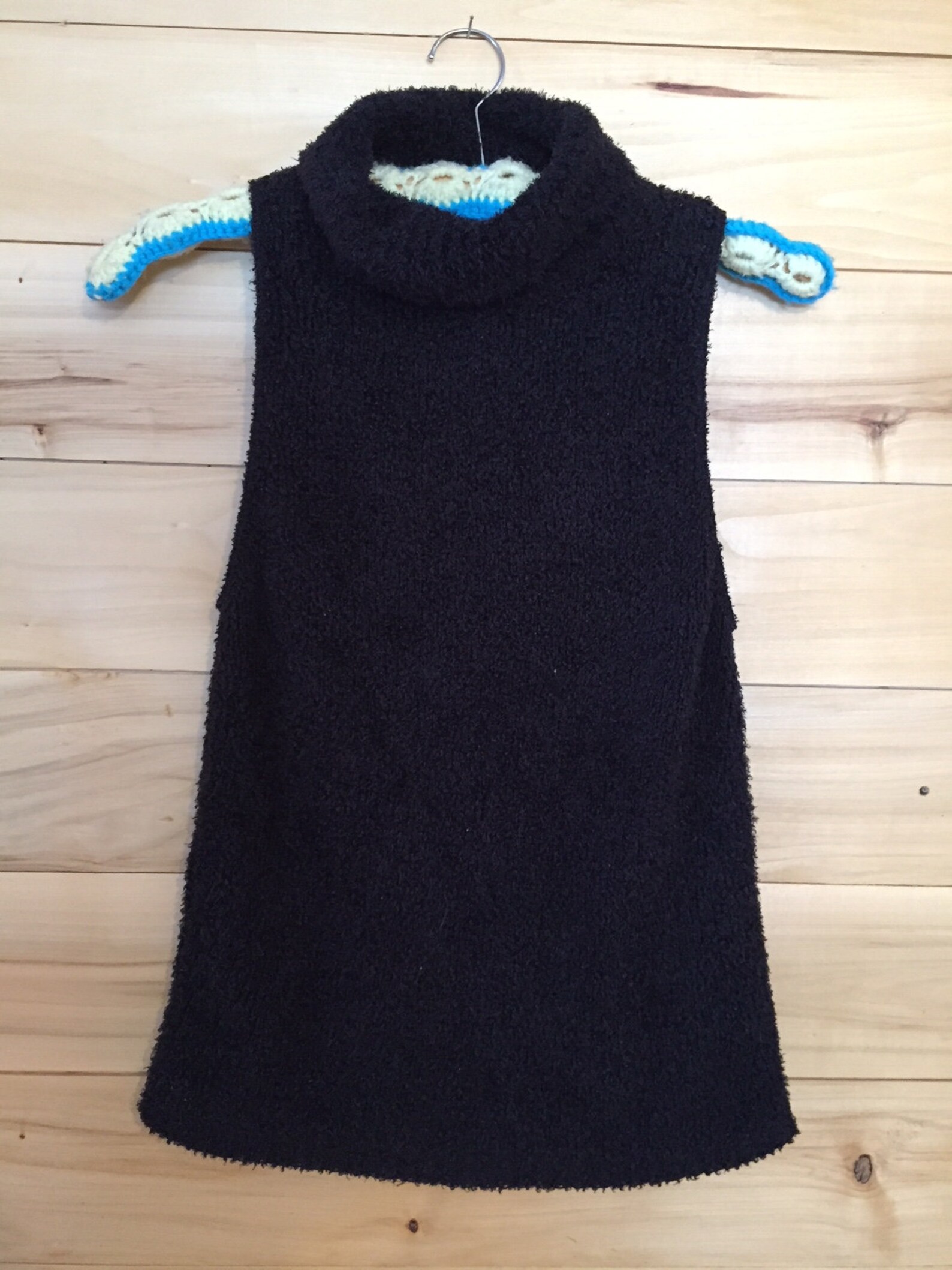 fuzzy sleeveless turtleneck