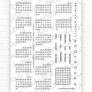 May include: A white paper sheet with multiple calendar layouts, each displaying numbered dates for different months. Includes the days of the week, month names, and geometric shapes.