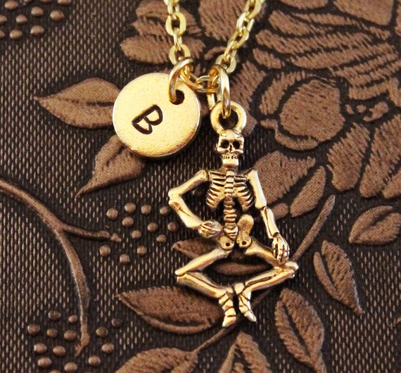 Gold skeleton necklace hotsell