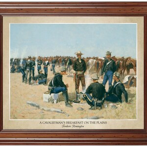 May include: A framed print of a painting titled "A Cavalryman's Breakfast on the Plains" by Frederic Remington. The artwork depicts a group of soldiers in blue uniforms gathered around a campfire, with horses in the background. The frame is a dark brown wood.