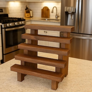 May include: A wooden display stand with six horizontal shelves, perfect for showcasing items. The stand is made of dark brown wood and has a stepped design. The text "Special Walnut" is at the bottom.