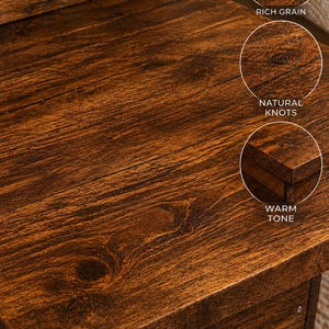 May include: Close-up of Early American stained wood furniture. The wood has a rich grain, natural knots, and a warm tone. The image highlights the stain detail and the quality of the wood.