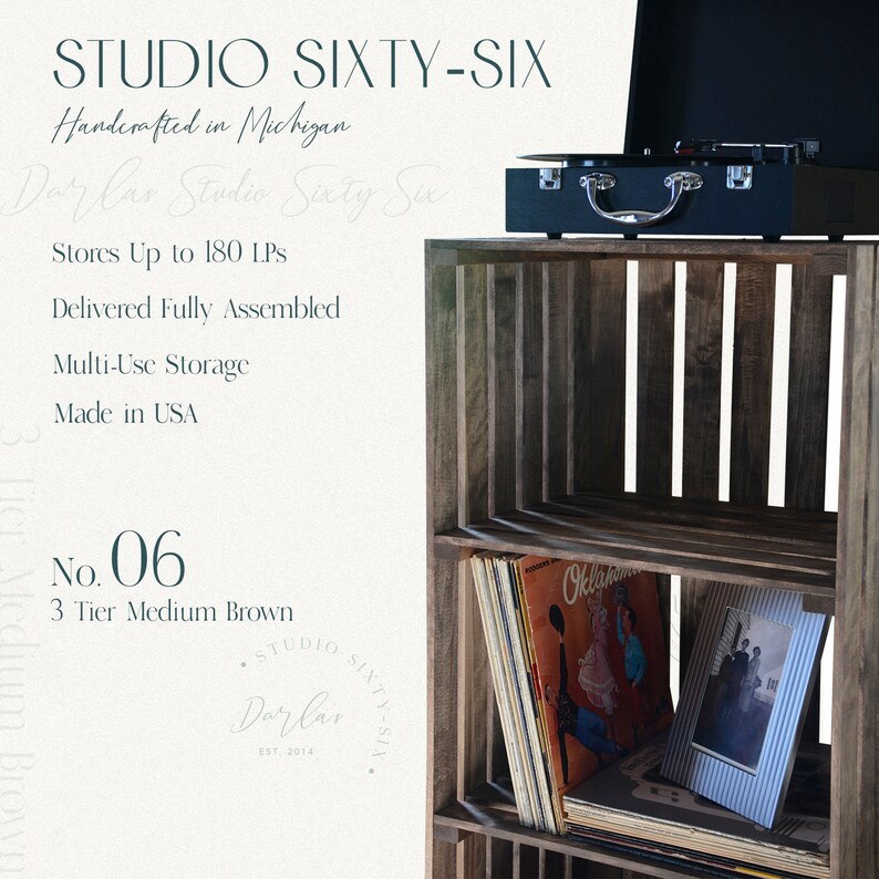 May include: A three-tier wooden record stand with a dark brown finish. The stand is made of reclaimed wood and has a rustic look. It is designed to hold up to 180 vinyl records. The stand is shown with a record player on top and records and a picture frame on the shelves. The text "Studio Sixty-Six" is visible on the stand.