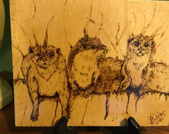 Wood Burning of Otters