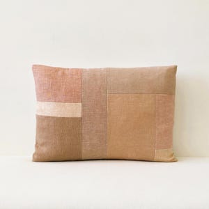 May include: A set of three ceramic nesting bowls in shades of blue, green, and white. The bowls feature a speckled glaze and a simple, modern design. The largest bowl is approximately 6 inches in diameter.