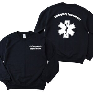 May include: Black sweatshirt with a white heartbeat graphic and the text "Emergency Department" on the front. The back of the sweatshirt has a white star of life symbol with a snake and the text "Emergency Department".