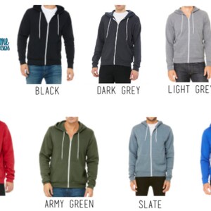 K&ouml;nnte beinhalten: Eine Auswahl an Rei&szlig;verschluss-Hoodies in verschiedenen Farben, darunter Schwarz, Dunkelgrau, Hellgrau, Rot, Armeegr&uuml;n, Schiefer und Royalblau. Die Hoodies sind alle aus einem weichen, bequemen Material gefertigt und haben ein klassisches Design.