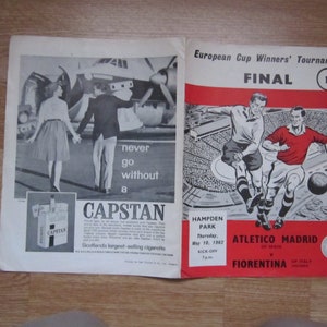 May include: A black and white image of a program for the European Cup Winners' Tournament Final. The game was played on May 10, 1962, at Hampden Park in Glasgow, Scotland. The teams playing were Atletico Madrid of Spain and Fiorentina of Italy.