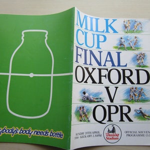 May include: A vintage Milk Cup Final program from 1986, featuring Oxford United versus QPR at Wembley Stadium. The cover has a green background with a bottle outline and the text "Everybody's body needs bottle."