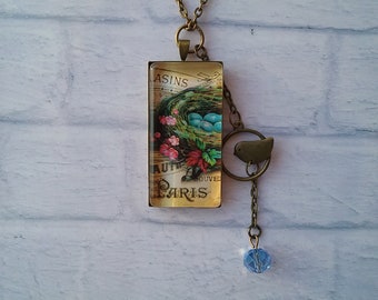 Beautiful Vintage Bird Nest 1x2 Inch Glass Pendant Necklace with Bird Charm in Antique Bronze