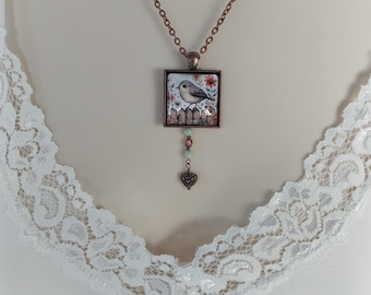 Beautiful Bird Glass Pendant Necklace in Antique Copper with Czech Glass Beads and Sweet Heart Bead that dangles from the back