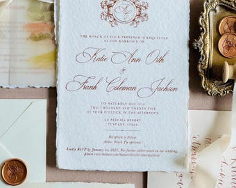 May include: Elegant wedding invitation suite featuring a main invitation with calligraphy, a 'Save the Date' card with a watercolor illustration, and wax seals. The invitation includes the names Katie Ann Orth and Frank Coleman Jackson.
