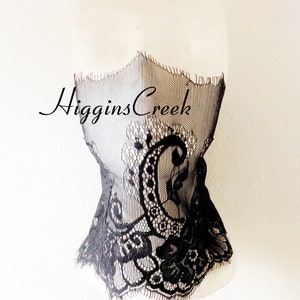 May include: Black lace trim with a floral pattern. The trim is on a white mannequin. The text "HigginsCreek" is visible in the image.