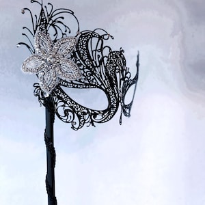 Black Masquerade Mask on stick with Flower Embellishment - Halloween Party Mask - Murder Mystery Mask for Women