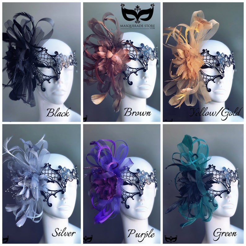 May include: Six masquerade masks with different colored feathers and flowers. The masks are black with rhinestones and a delicate lace design. The colors of the feathers and flowers are black, brown, yellow, silver, purple, and green.