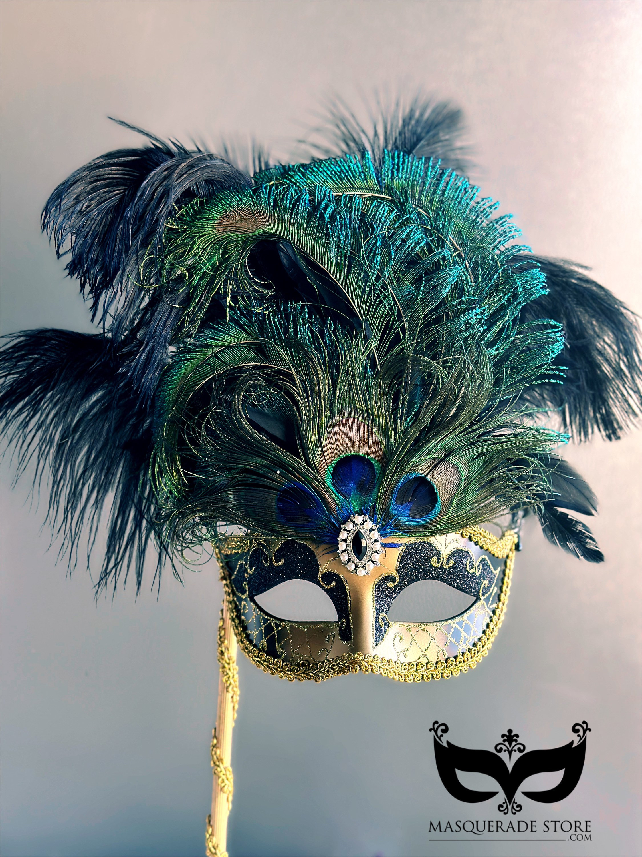 MASCHERA REALE ORO CON GEMMA STRASS, DECORATA CON GLITTER E PIUME