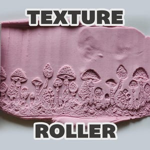 May include: A white cylindrical texture roller featuring a detailed mushroom forest pattern. The roller is shown alongside a pink clay slab imprinted with the same mushroom design. The text "TEXTURE ROLLER" is displayed in bold letters at the top and bottom.